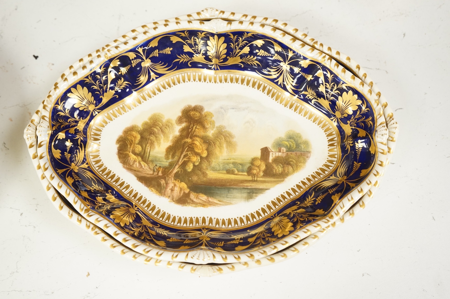 A Bloor Derby titled view part dessert service, c.1820 to include View on the Wye and View in Yorkshire, largest 29cm wide (16)